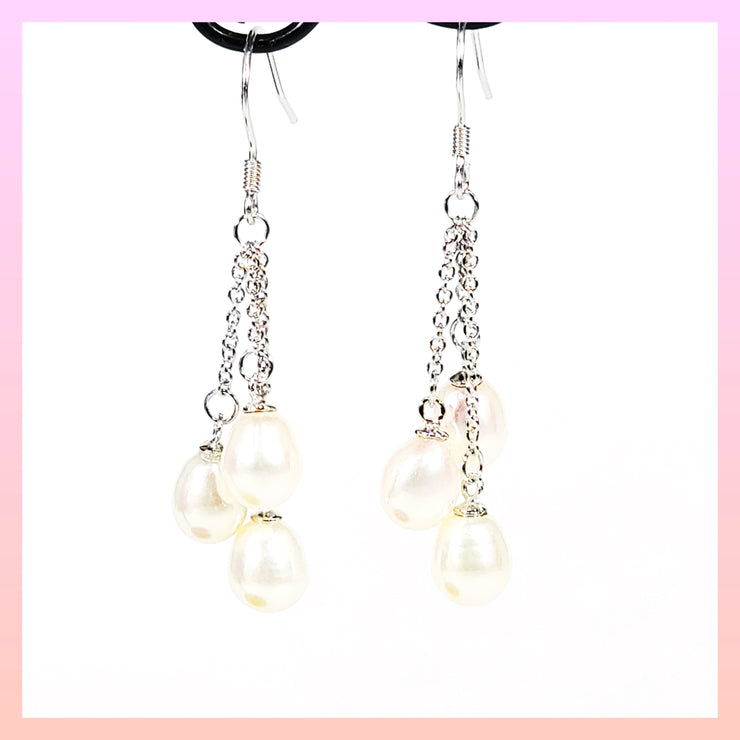 three white pearl dangle earrings Leila Jewels