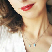small opal hamsa necklace
